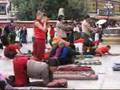 Pilgrims prostrating at Jokhang temple, Lhasa, Tibet