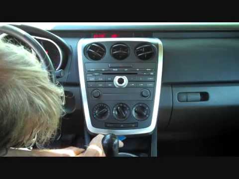 how to remove cx 7 door panel