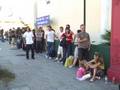 Fans line up outside Sam Ash Music to meet Slash