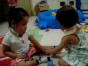 Maile and Gigi battle with blocks