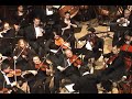 the new texas symphony orchestra, based in dallas, performs the fourth movement (allegro con fuoco) of antonin dvorak's symphony no. 9, 