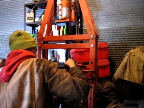 how to rebuild snowmobile shocks