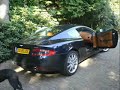 Black Aston Martin DB9 Being Revved Hard