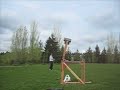 Invention and perfection of the Floating Axle King Arthur Trebuchet. I (Craig Macomber) invented  the Floating Axle King Arthur Trebuchet (FAKA) in October 2006. The design was optimized through computer simulations and scaled up to make the Golf Ball Beast (GBB) in 2007. GBB threw over 320 feet with 5 pounds of counterweight, and 690 feet with 15 pounds. My design was then scaled up and improved structurally by the engineers at Janicki Industries when they made J-Buchet which was entered in the Burlington Pumpkin Pitch in late September 2007. It got second with a top throw of 1083.9 feet and won the efficiency award. See http://thehurl.wikidot.com/trebuchettypes:faka for more info