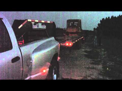 Gooseneck - The video quality is bad because of the lack of light. My brother came with a guy to haul his dozer right. I look down the road expecting a 18 wheeler, but t...