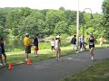 maribeth crossing the finish line at the rockaway rotary/ pam miller 5k race on june 2, 2007