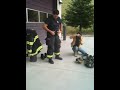 Firefighter getting dressed