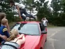 Guy Jumpping over car due to Boardem
