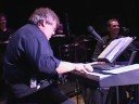 phil naro and don mancuso of d drive with the greece athena high school orchestra playing chicago's 25 or 6 to 4