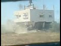 D-9 destroying a house