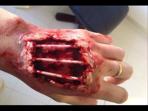 sfx - I've been feeling like doing special effects makeup lately, so heres another of many SFX looks i've created! A hacked hand with exposed bones! Simple, easy a...