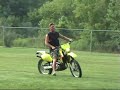jeff on suzuki drz 450 wheelies in back yard