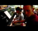meitar on the piano with the family