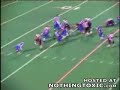 runningback leaps over competition