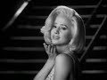 seemingly despondent over her firing from fox, marilyn visits with eddie (ted jordan) one last time before heading to mexico.  though eddie knows she's desperate for someone to love her, he decides to walk away, leaving marilyn; still haunted by norma jean; to her own devices.  contrary to what's depicted here, monroe did not have a seizure in the back of an ambulance and die.  she was found on her side unconscious and dead by her housekeeper on august 5, 1962.  two independent investigations into her death were conducted, one suggesting that the conspiracy theory of murder was not such, but rather a medical conspiracy, as monroe's doctor's internist stated he was unaware that her primary physician, dr. greenson, had refilled her prescription of nembutal that later interacted with the chloral hydrate she was given as a sleeping aid earlier.  the 1982 investigation revealed no evidence that a criminal act had been committed, though monroe was categorized as a 