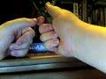 ::I have to say sorry for seeming rushed. I shot this about 5 times, each time going over the ten minute limit. I kinda wanted to get this in one video for ease of view and myself waiting to upload these.::Benchmade GriptilianBlade: 3 1/2 inch 154 CM Stainless Steel Blade. Some are coated for stronger rust resistance. Bare blades are featured also. Tanto line for more cutting choice.Handle: Noryl, GTX, Zytel. Lots of choices, but basically all the same I'm pretty sure.Lock: AXIS Lock. Makes for good one handed opening and is easy to use, just watch your fingers.Deployment: Using the AXIS you get it out very fast. If you use the thumbstud, theres a chance of failing getting the knife locked. VERY smooth opening.Price: $80-$85 US. Look around though, there are lower prices out there.Comments: Knife is great. Benchmade lives up to its name. Could be the best gripped knife on the market. Mel Pardue model, look around at his other stuff if you dont know him, good knifemaker.If you are interested in the mini- grip, It is the model 556, not 550. Overall length is a bit over 6and a half inches, blade is just under 3 inches.With the griptilians, there are tanto blades, drop point blades, bare steel, coated, loads of different colors of handles, thumbstubs, thumbhole. Find the perfect one for you.