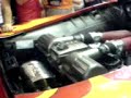 ferrari cuspindo fogo na bienal do tomovel