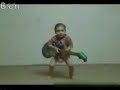 A 2years old boy plays juitar