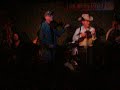 Vince Gill plays and sings in a small honky tonk in Nashville.