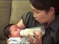 Marina feeding Christian