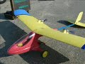 landing model airplane on driving car