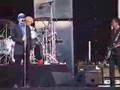 R.E.M play a request in Hyde Park, London on 16/07/05.