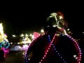 this is the very beginning of the magic kingdom's nighttime light parade, spectromagic. 

this part includes the trumpeteers, the spectromen, the logos, and, of course, mickey mouse.