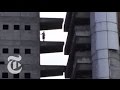 World: Squatters on the Skyline - nytimes.com/video