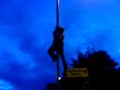 nathan plews climing a lampost