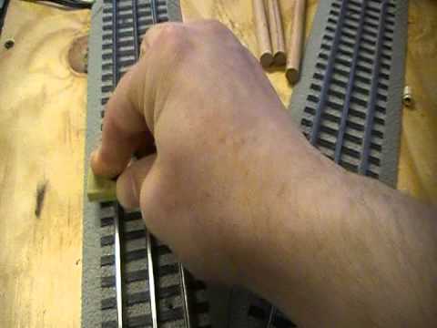 how to clean lionel o gauge track