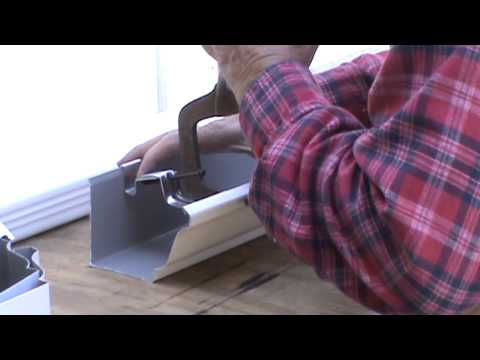 how to fasten gutter to house