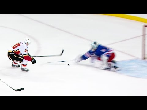 Video: Flames’ Lazar pokes puck under Lundqvist to score first of the season