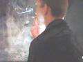 Force smoking nostrils exhales full cigarette