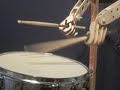 steve averill's robot drummer project continues. this one is made from wood and high speed digital rc servos. demo of some fast snare drum work. it uses highly liquid md24 for midi to servo driver.