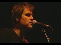 live at shepherds bush empire, london. the video was on the karaoke single that was released in june 2003, so this was filmed sometime before that.

this was tom's first band formation:
cello: oliver kraus (aka oli)
keyboard: olli cunningham
drums: ash soan