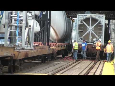 Railfan - Well folks, you are about to see something very rare in the world of railfanning. This video shows a windmill train being loaded on an Alaska-bound railbarge...