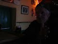 a irish old man sing a song in gaelic (irish language) in a small traditional pub in county kerry, in the south of ireland!