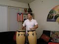 James Pajela playing congas