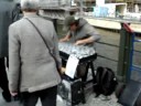 Glass arp street musician