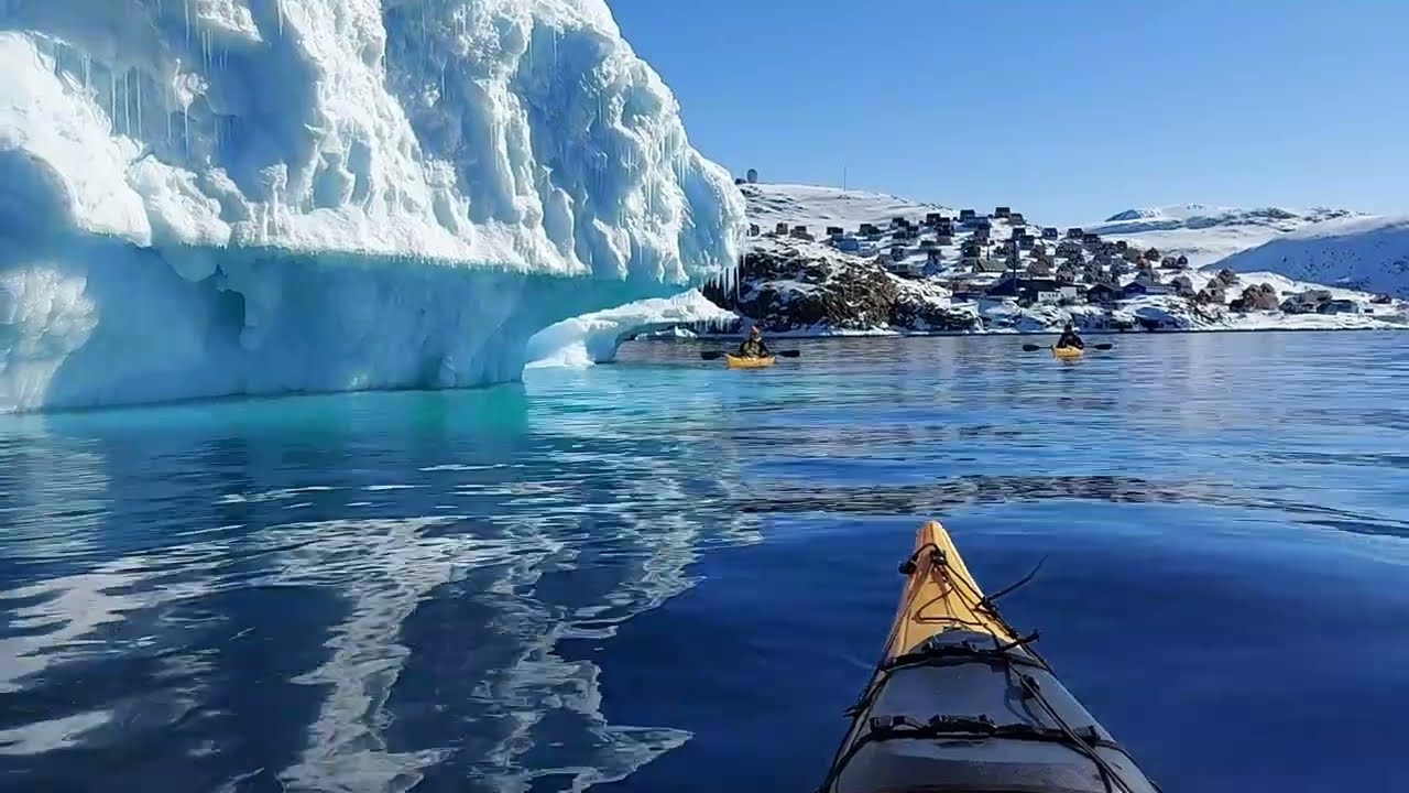 Spring finally came to Upernavik. Kayaking in Northwest Greenland, among icebergs.