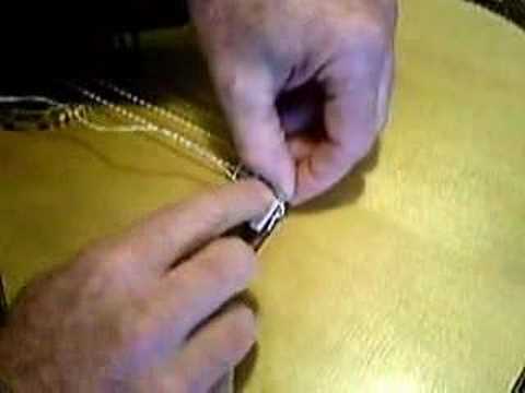 how to fasten nylon guitar strings
