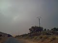La palmeraie de Taghit à travers le parebrise.