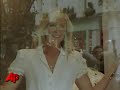 former wimbledon champ maria sharapova took a turn at modeling in a london storefront this week as she prepares for the upcoming wimbledon tournament. (june 19)