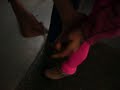 andera clipping her toe nail with a sissors andera clipping her toe nail with a sissors