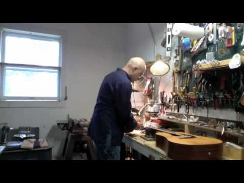 how to adjust acoustic guitar string height