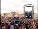 Brian May playing God Save the Queen on the roof of buckingham palace for Queen's golden jubilee 2002