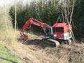 O&K RH8 mit Hydraulik Powerpack, Tiltrotator und AHWI Mulchaggregat im Einsatz 2/3