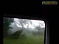 Sudden tornado while driving car