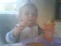Harry feeding himself