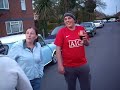 man wearing thong and bra riding petrol scooter